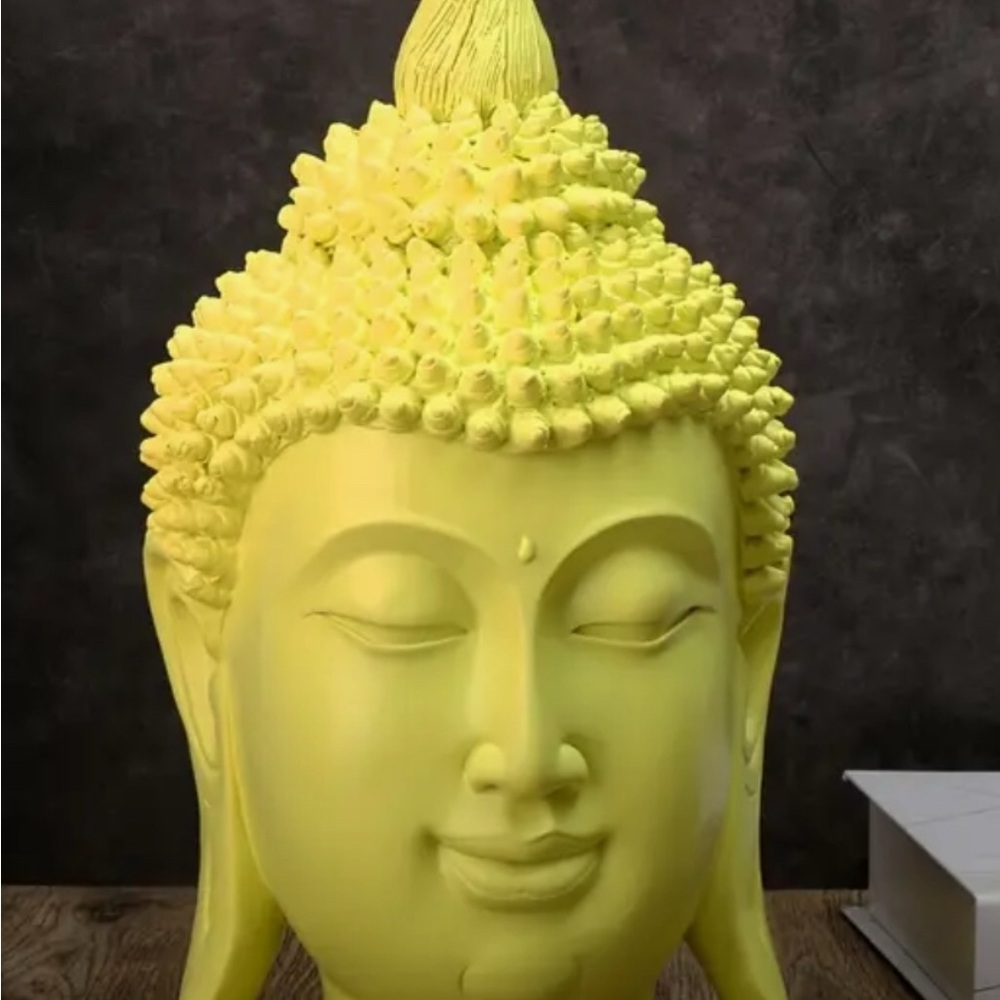 Yellow Buddha Head Sculpture